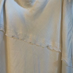 Harold’s white linen skirt with ruffle accents. Size 14.